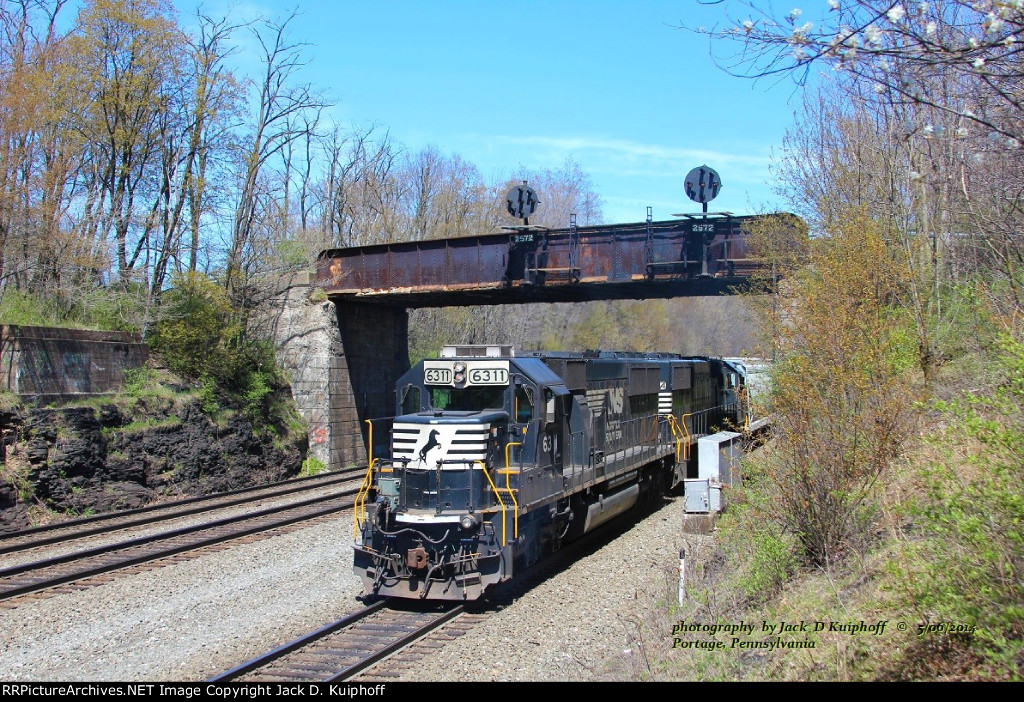 NS 6311 eastbound helper on 64K, mp258 Portage, Pennsylvania. June 6, 2014. 